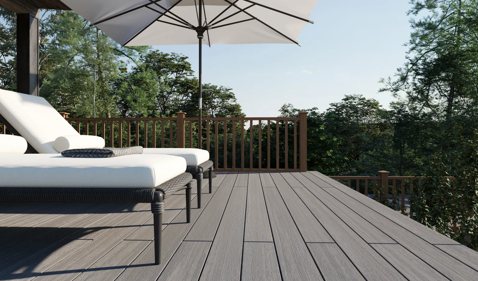 Premium composite decking is a contemporary decking material made from recycled plastic and wood fibres. This cutting-edge composite has the appearance of wood with the added benefit of outstanding durability and little maintenance. It’s also generally non-slip, and these types of decking boards tend to have a 25-year lifespan.
Premium composite decking is ideal for outdoor use because it is far more resistant to rot, decay, and insect damage than wood. It also maintains its colour year after year, and even dark carbon decking won’t get white streaks or lighten much beyond its original colour. This is because it is designed to be UV-stable and is not as affected as wood by the sun’s strong rays.
This type of decking offers an environmentally responsible and long-lasting way to create gorgeous outdoor areas for both residential and commercial projects. It is designed to elevate any space and provide a stunning wooden aesthetic without the ongoing maintenance.